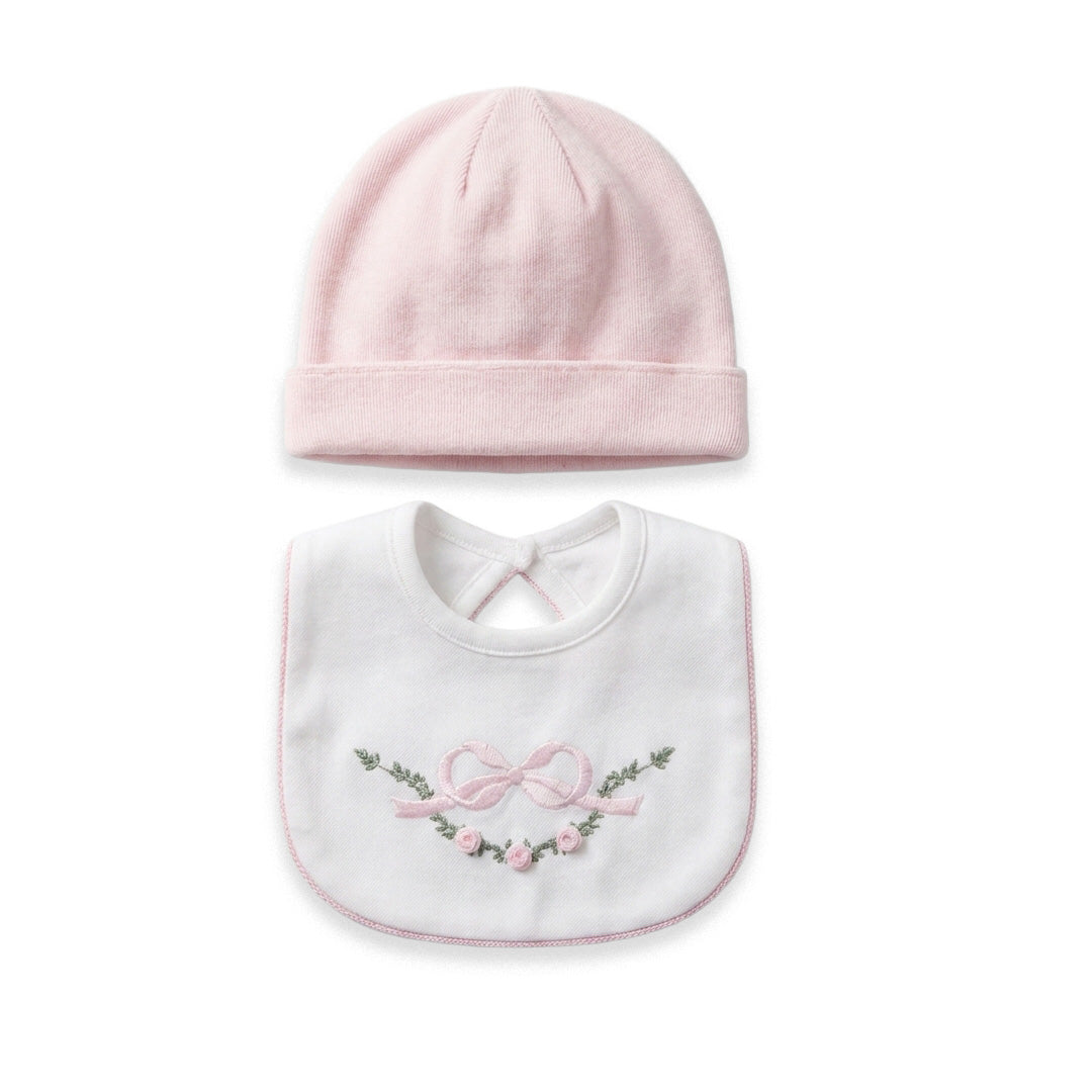 Set cuffietta e bavaglino bianco e rosa cipria con ricamo floreale
