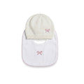 Set cuffietta e bavaglino bianco in lana e spugna con fiocchetti rosa