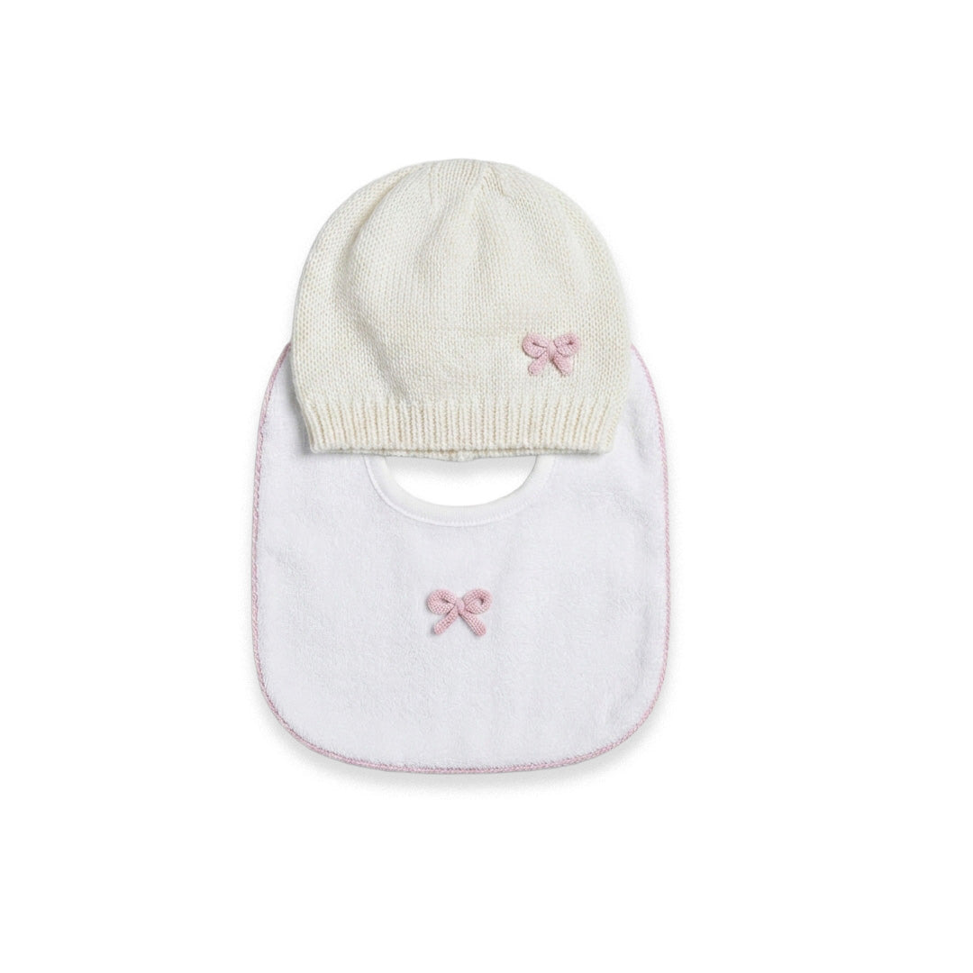 Set cuffietta e bavaglino bianco in lana e spugna con fiocchetti rosa